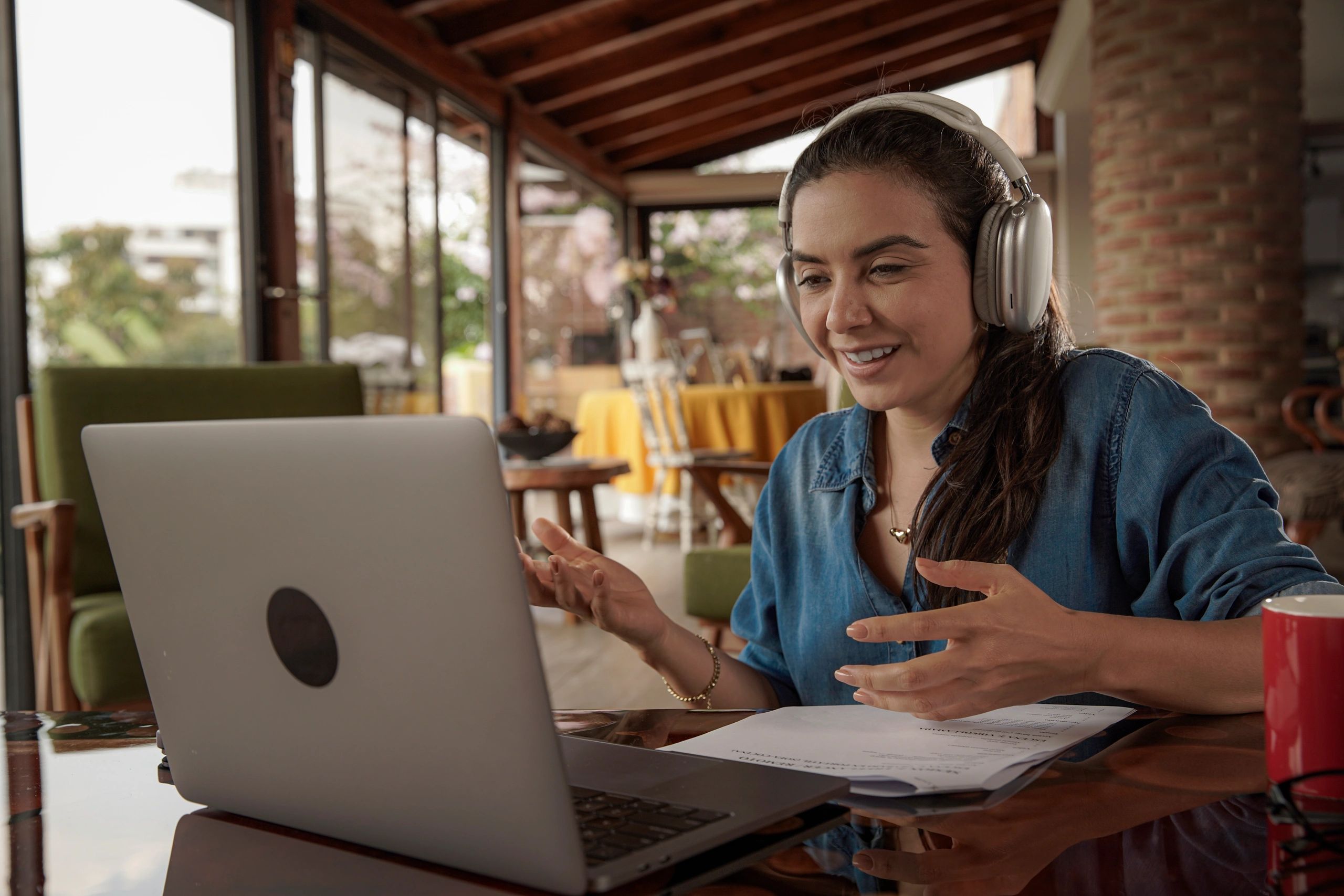 Woman joining a video call from a laptop